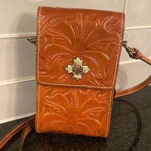 Patricia Nash extra small cross body purse.